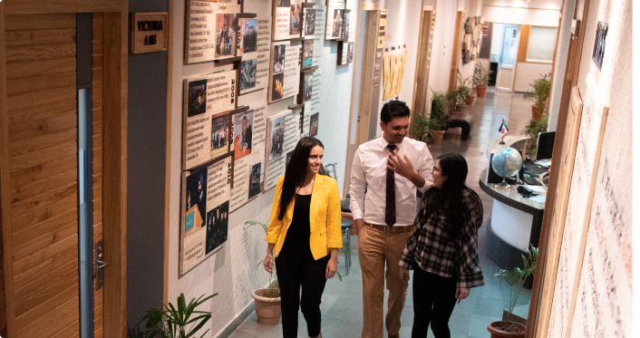 Students Walking in Corridor