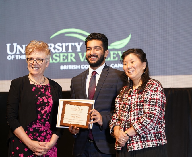 student getting Continued Academic Excellence Award