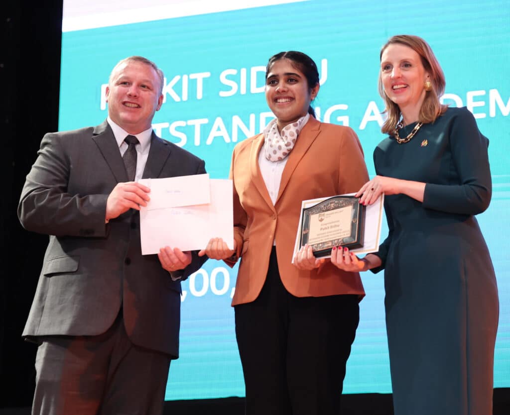 girl getting Entrance Scholarships and she has smile on her face